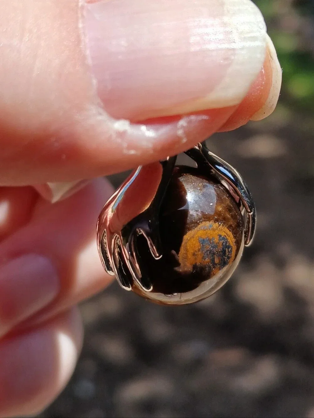New 18K Hands Holding Tiger Eye Sphere Pendant.